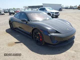 2022 Porsche Taycan GTS z VIN WP0AD2Y12NSA59275, wystawiony jako IAAI lot #42170547 z przebiegiem 43 757 mil mil oraz . Historia ofert i sprzedaży dostępna na DreamBid. Obrazek 1.
