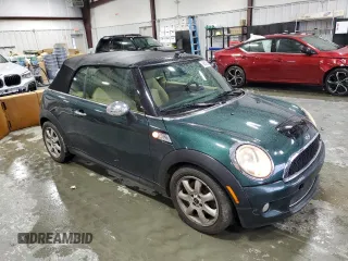 2010 MINI Convertible S z VIN WMWMS3C54ATY51980, wystawiony jako Copart lot #56589265 z przebiegiem 147 136 mil mil oraz Szkoda całkowita • Salvage title. Historia ofert i sprzedaży dostępna na DreamBid. Obrazek 4.