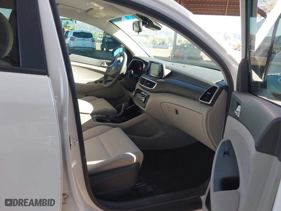 2019 Hyundai Tucson Value with VIN KM8J33A49KU979927, listed as a IAAI auction lot 41818355 with 96,208 mi miles. Bid and sale history available at carsss.com. Image 5.