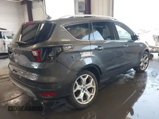 2019 Ford Escape Titanium with VIN 1FMCU9J97KUC55772, listed as a IAAI auction lot 42514001 with 77,737 mi miles and . Bid and sale history available at DreamBid. Image 4.