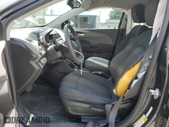 2016 Chevrolet Sonic LT with VIN 1G1JC5SH4G4119418, listed as a Copart auction lot 55809185 with 97,740 mi miles and Salvage title. Bid and sale history available at DreamBid. Image 7.
