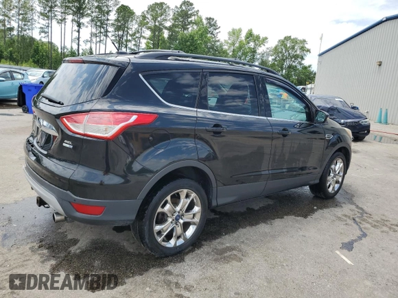 2013 Ford Escape SEL with VIN 1FMCU9HX0DUD23563, listed as a Copart auction lot 58691535 with 170,031 mi miles and Salvage title. Bid and sale history available at DreamBid. Image 3.