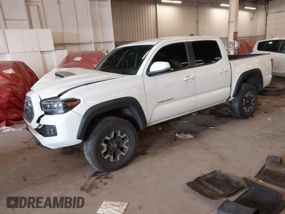2021 Toyota Tacoma SR z VIN 5TFCZ5AN1MX268370, wystawiony jako IAAI lot #41922632 z przebiegiem 50 358 mil mil oraz . Historia ofert i sprzedaży dostępna na DreamBid. Obrazek 17.