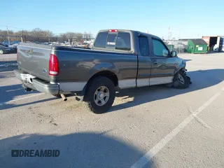 2002 Ford F-150 XL with VIN 1FTRX17L52NA85965, listed as a IAAI auction lot 41796633 with 171,814 mi miles. Bid and sale history available at carsss.com. Image 4.