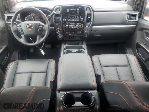 2024 Nissan Titan Pro-4X with VIN 1N6AA1ED8RN118197, listed as a Copart auction lot 64471595 with 3,576 mi miles and Salvage title. Bid and sale history available at DreamBid. Image 8.