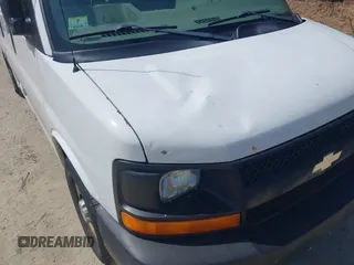 2008 Chevrolet Express Cargo Van with VIN 1GCGG25C381208002, listed as a IAAI auction lot 42067122 with 165,007 mi miles. Bid and sale history available at carsss.com. Image 12.