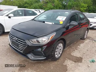 2021 Hyundai Accent SE with VIN 3KPC24A62ME147077, listed as a IAAI auction lot 42013901 with 59,363 mi miles. Bid and sale history available at carsss.com. Image 2.