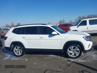 2021 Volkswagen Atlas SE z VIN 1V2WR2CA4MC514968, wystawiony jako IAAI lot #41414547 z przebiegiem 133 946 mil mil oraz . Historia ofert i sprzedaży dostępna na DreamBid. Obrazek 13.