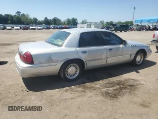 1999 Mercury Grand Marquis LS z VIN 2MEFM75W5XX673218, wystawiony jako Copart lot #52621285 z przebiegiem 163 642 mil mil oraz Szkoda całkowita • Salvage title. Historia ofert i sprzedaży dostępna na DreamBid. Obrazek 3.