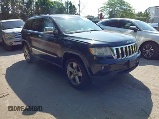 2011 Jeep Grand Cherokee Overland Summit with VIN 1J4RR6GT4BC683851, listed as a IAAI auction lot 42817898 with 181,235 mi miles and . Bid and sale history available at DreamBid. Image 1.