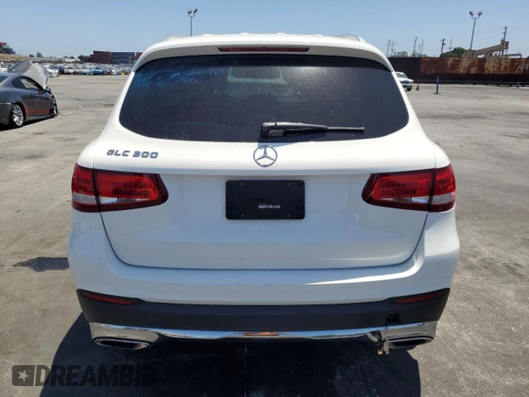 2018 Mercedes-Benz GLC 300 with VIN WDC0G4JB7JV020392, listed as a Copart auction lot 60997945 with 128,392 mi miles and Salvage title. Bid and sale history available at DreamBid. Image 6.
