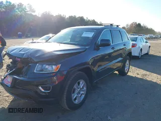 2014 Jeep Grand Cherokee Laredo with VIN 1C4RJEAG3EC218128, listed as a IAAI auction lot 40951611 with 119,596 mi miles and . Bid and sale history available at DreamBid. Image 17.