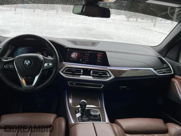 2021 BMW X5 xDrive40i with VIN 5UXCR6C03M9G52955, listed as a Copart auction lot 41009913 with 7,476 mi miles. Bid and sale history available at carsss.com. Image 9.