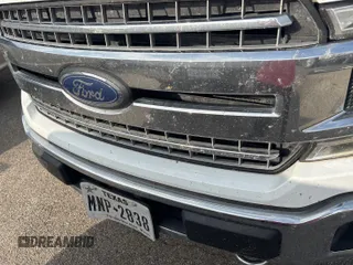 2019 Ford F-150 XL with VIN 1FTFW1E42KKF27037, listed as a IAAI auction lot 42777832 with 169,179 mi miles and . Bid and sale history available at DreamBid. Image 1.
