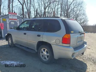 2008 GMC Envoy SLE2 with VIN 1GKDT13S182246605, listed as a IAAI auction lot 41801577 with 116,200 mi miles. Bid and sale history available at carsss.com. Image 3.