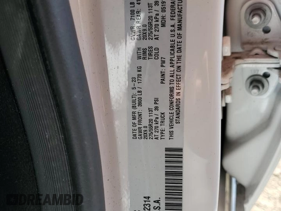 2023 Ram 1500 Big Horn with VIN 1C6SRFFT5PN652314, listed as a Copart auction lot 59323735 with 28,721 mi miles and Salvage title. Bid and sale history available at DreamBid. Image 12.