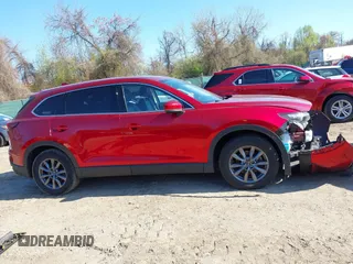 2020 Mazda CX-9 Touring z VIN JM3TCBCY6L0401324, wystawiony jako IAAI lot #41973626 z przebiegiem 53 891 mil mil oraz . Historia ofert i sprzedaży dostępna na DreamBid. Obrazek 14.