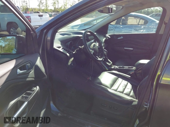 2016 Ford Escape Titanium with VIN 1FMCU9J94GUA63359, listed as a IAAI auction lot 41954514 with 94,315 mi miles. Bid and sale history available at carsss.com. Image 5.