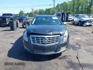 2014 Cadillac XTS Luxury z VIN 2G61M5S37E9211547, wystawiony jako IAAI lot #42373128 z przebiegiem 146 354 mil mil oraz . Historia ofert i sprzedaży dostępna na DreamBid. Obrazek 12.