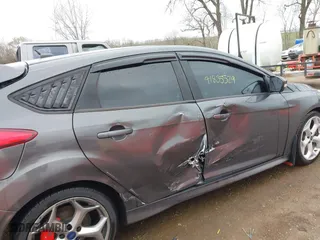 2015 Ford Focus ST with VIN 1FADP3L93FL321830, listed as a IAAI auction lot 41835529 with 106,901 mi miles. Bid and sale history available at carsss.com. Image 13.