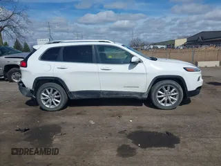 2015 Jeep Cherokee Limited with VIN 1C4PJMDS7FW522581, listed as a IAAI auction lot 41870516 with 143,904 mi miles and . Bid and sale history available at DreamBid. Image 13.
