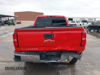 2017 Chevrolet Silverado 1500 LT with VIN 1GCRCREC1HZ248996, listed as a IAAI auction lot 40847060 with 100,215 mi miles and . Bid and sale history available at DreamBid. Image 16.
