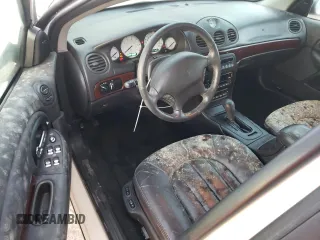 2000 Chrysler 300M M z VIN 2C3HE66G9YH195653, wystawiony jako Copart lot #76975394 z przebiegiem 78 136 mil mil oraz Nie do naprawy • Non repairable. Historia ofert i sprzedaży dostępna na DreamBid. Obrazek 8.