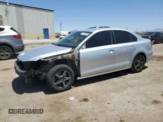 2014 Volkswagen Jetta S with VIN 3VW2K7AJ2EM298717, listed as a Copart auction lot 57688895 with 127,022 mi miles and Salvage title. Bid and sale history available at DreamBid. Image 1.