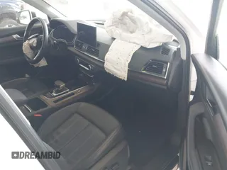 2021 Audi Q5 Premium Plus z VIN WA1BAAFY5M2004171, wystawiony jako IAAI lot #42140899 z przebiegiem 62 544 mil mil oraz . Historia ofert i sprzedaży dostępna na DreamBid. Obrazek 5.