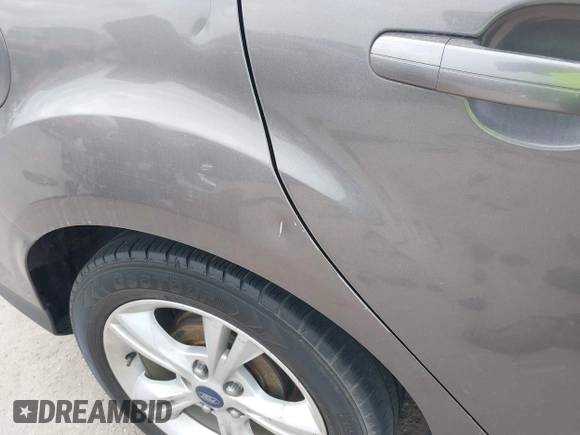 2014 Ford Focus SE with VIN 1FADP3F27EL139920, listed as a IAAI auction lot 42024617 with 143,223 mi miles and . Bid and sale history available at DreamBid. Image 12.