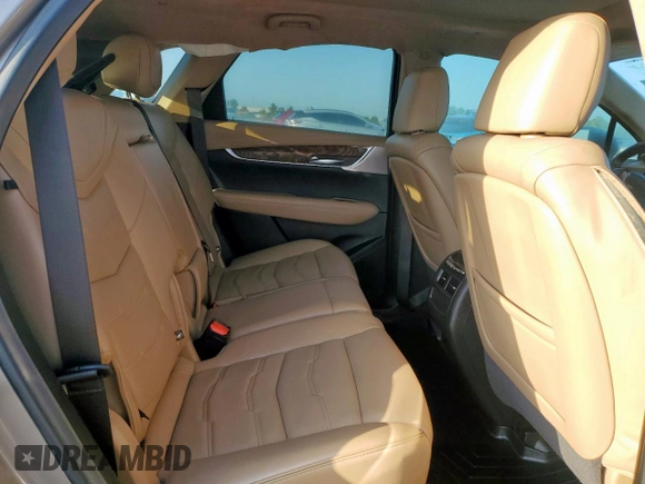 2022 Cadillac XT5 Premium Luxury FWD z VIN 1GYKNERS9NZ120517, wystawiony jako Copart lot #58978045 z przebiegiem 31 456 mil mil oraz Szkoda całkowita • Salvage title. Historia ofert i sprzedaży dostępna na DreamBid. Obrazek 11.