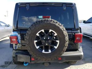 2024 Jeep Wrangler Rubicon with VIN 1C4RJXR69RW132849, listed as a Copart auction lot 48237325 with 18,725 mi miles and Salvage Title. Bid and sale history available at DreamBid. Image 6.