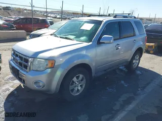 2010 Ford Escape Limited with VIN 1FMCU9EG8AKB12610, listed as a IAAI auction lot 41834872 with 214,218 mi miles. Bid and sale history available at carsss.com. Image 2.