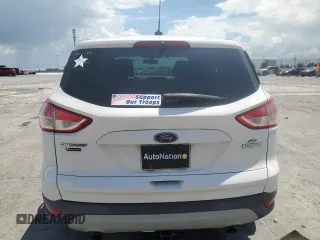 2013 Ford Escape SE z VIN 1FMCU0GX6DUD64499, wystawiony jako Copart lot #60971245 z przebiegiem 63 411 mil mil oraz Szkoda całkowita • Salvage title. Historia ofert i sprzedaży dostępna na DreamBid. Obrazek 6.