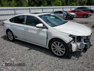 2013 Toyota Avalon XLE with VIN 4T1BK1EB2DU061038, listed as a Copart auction lot 63974195 with 122,432 mi miles and Salvage title. Bid and sale history available at DreamBid. Image 4.