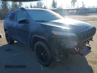 2014 Jeep Cherokee Latitude with VIN 1C4PJMCS7EW286546, listed as a IAAI auction lot 41398331 with 73,650 mi miles and . Bid and sale history available at DreamBid. Image 1.