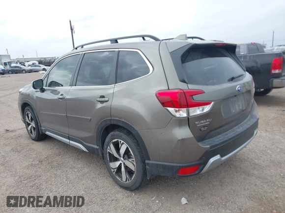 2021 Subaru Forester Touring with VIN JF2SKAXC9MH556986, listed as a IAAI auction lot 41717748 with 33,573 mi miles. Bid and sale history available at carsss.com. Image 3.