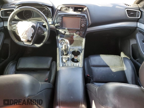 2016 Nissan Maxima SV z VIN 1N4AA6AP8GC392465, wystawiony jako Copart lot #88349325 z przebiegiem Nie podano mil oraz Szkoda całkowita • Salvage title. Historia ofert i sprzedaży dostępna na DreamBid. Obrazek 8.
