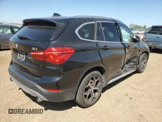 2018 BMW X1 xDrive28i with VIN WBXHT3C38J5K28174, listed as a Copart auction lot 57333385 with 50,064 mi miles and Salvage title. Bid and sale history available at DreamBid. Image 3.