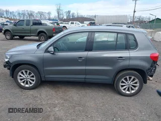 2017 Volkswagen Tiguan S with VIN WVGBV7AX9HK049420, listed as a IAAI auction lot 41838301 with 118,490 mi miles and . Bid and sale history available at DreamBid. Image 14.