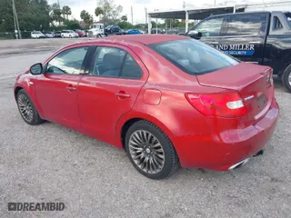 2012 Suzuki Kizashi SE with VIN JS2RE9A31C6101027, listed as a IAAI auction lot 41213426 with 174,490 mi miles. Bid and sale history available at carsss.com. Image 3.