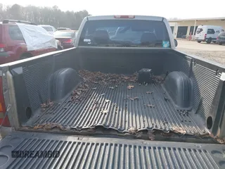 1999 Chevrolet Silverado 1500 with VIN 1GCEC14W8XZ104775, listed as a IAAI auction lot 41507939 with 252,951 mi miles. Bid and sale history available at carsss.com. Image 8.