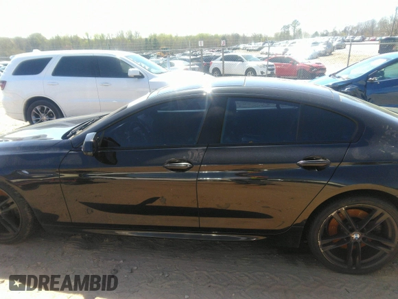 2014 BMW 6 Series 640i z VIN WBA6A0C57EDZ04682, wystawiony jako IAAI lot #41891362 z przebiegiem 140 478 mil mil oraz . Historia ofert i sprzedaży dostępna na DreamBid. Obrazek 14.
