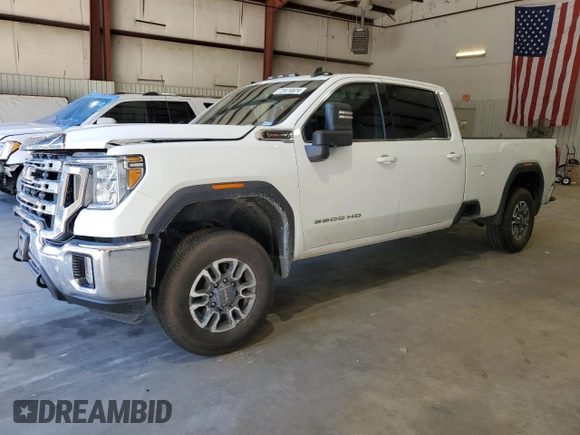 2021 GMC Sierra 1500 with VIN 1GT48ME7XMF253322, listed as a Copart auction lot 73474824 with 130,263 mi miles and Salvage Title. Bid and sale history available at DreamBid. Image 1.