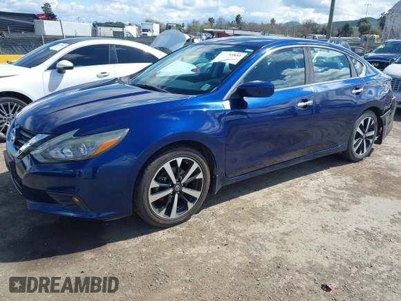 2018 Nissan Altima 2.5 S with VIN 1N4AL3AP3JC142423, listed as a IAAI auction lot 41793851 with 61,391 mi miles. Bid and sale history available at carsss.com. Image 18.