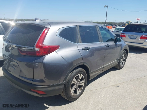 2017 Honda CR-V LX with VIN 7FARW5H33HE014039, listed as a IAAI auction lot 41830031 with 85,730 mi miles. Bid and sale history available at carsss.com. Image 4.