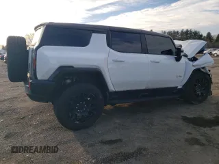 2025 GMC Hummer EV 2X with VIN 1GKB0NDE5SU102096, listed as a Copart auction lot 47083615 with 8,713 mi miles and Salvage Title. Bid and sale history available at carsss.com. Image 3.