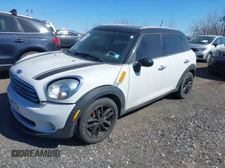 2012 MINI Countryman with VIN WMWZB3C50CWM03775, listed as a IAAI auction lot 41876928 with 151,366 mi miles and . Bid and sale history available at DreamBid. Image 2.