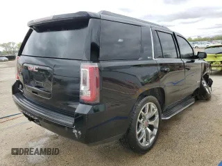 2015 GMC Yukon SLT z VIN 1GKS2BKC1FR112708, wystawiony jako Copart lot #53963165 z przebiegiem 123 331 mil mil oraz Szkoda całkowita • Salvage title. Historia ofert i sprzedaży dostępna na DreamBid. Obrazek 3.