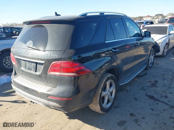 2016 Mercedes-Benz GLE with VIN 4JGDA5HB0GA777960, listed as a IAAI auction lot 41406957 with 137,026 mi miles. Bid and sale history available at carsss.com. Image 4.